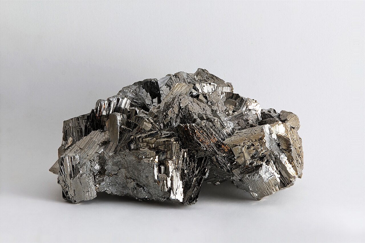 Grey, metallic crystals of arsenopyrite