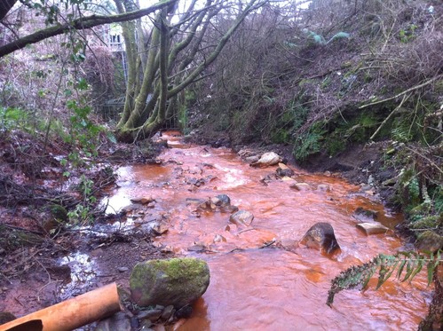 Mine water discharge, Nantyffyllon, South Wales. Industrial activity in both the past and the present may cause pollution of groundwater. © BGS/UKRI.