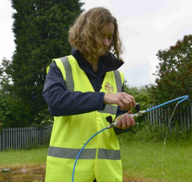 Figure 1. Collecting a groundwater sample for dissolved methane analysis.