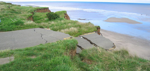 The principal mode of landsliding in upper cliff is rotational slumping.