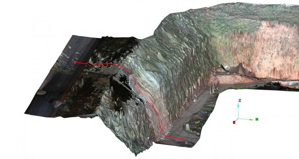 LiDAR scan showing the location of cross section in Figure 6b in red © BGS. N.B. This survey was carried out after the landslide debris had been removed.