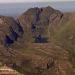 Oblique aerial view of the east flank of An Teallach, Ross and Cromarty. The lower slopes of ice-scoured Torridonian sandstone contrast with the frost-shattered slopes on the ridge and the Glas Mheall Liath quartzite blockslopes.