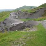In 1979, the the A625 road was permanently closed to traffic and what remains today is an interesting example of landslide movement and repeated road reconstruction and repair.