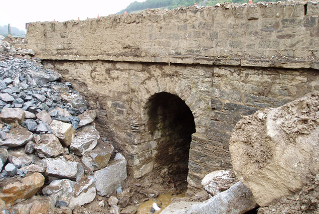 Stone culvert where the stream is normally diverted.