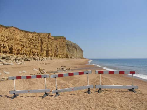 Access to the beach where the fatal landslide occurred is restricted while geologists assess the immediate danger. Taken 25 July 2012.