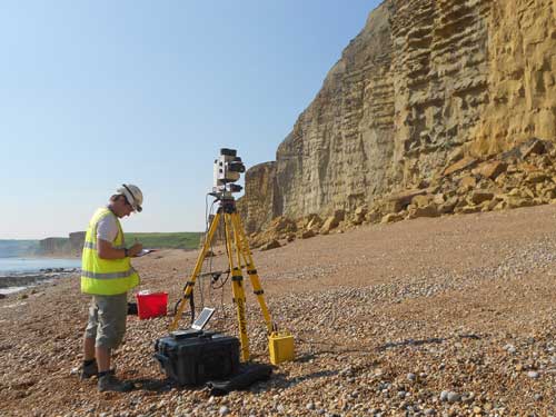 The British Geological Surveys' Landslide Response Team map the collapsed cliff from a safe distance using a LiDAR, laser, scanner. Taken 25 July 2012.