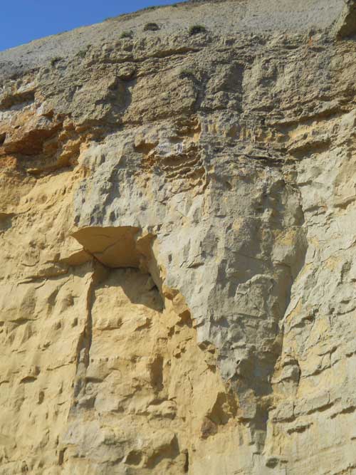 The presence of wide open cracks in cliff face provides a natural warning sign that cliffs may be unstable and potentially dangerous. Taken 25 July 2012.