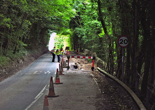 In addition to the features seen on the slopes, damage was also viewed on the road (B5056) and adjoining wall.