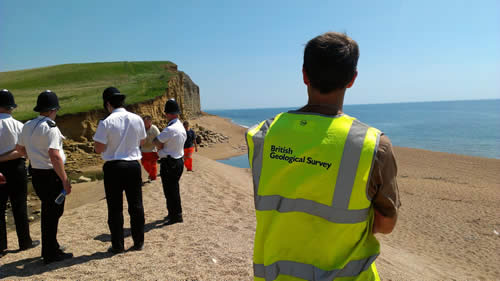 On 25 July 2012, the BGS Landslide Response Team waiting for access to the beach to carry out a survey of the landslide.