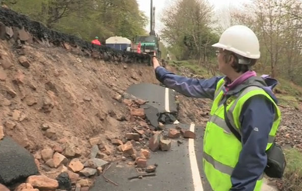 Dr Helen Reeves of the Landslide Response Team investigating the landslide along the B6344, East of Rothbury, Northumberland.