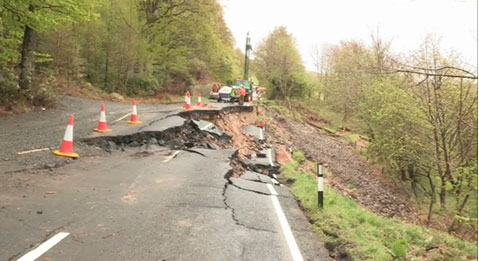 Signs of instability along the B6344 east of Rothbury in Northumberland, UK.