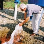 Water pouring out of the ground