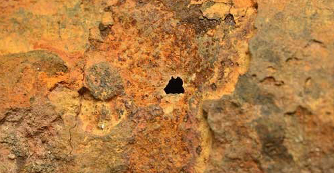 Pitting and perforation of cast iron
