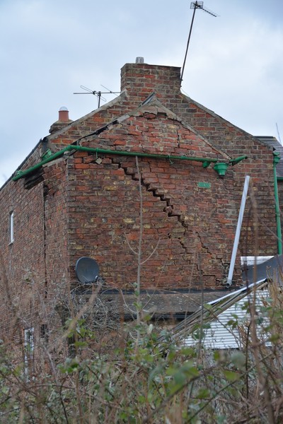Damage caused to No 26 Magdalen’s Close by sinkhole that developed on Monday 17 February 2014.