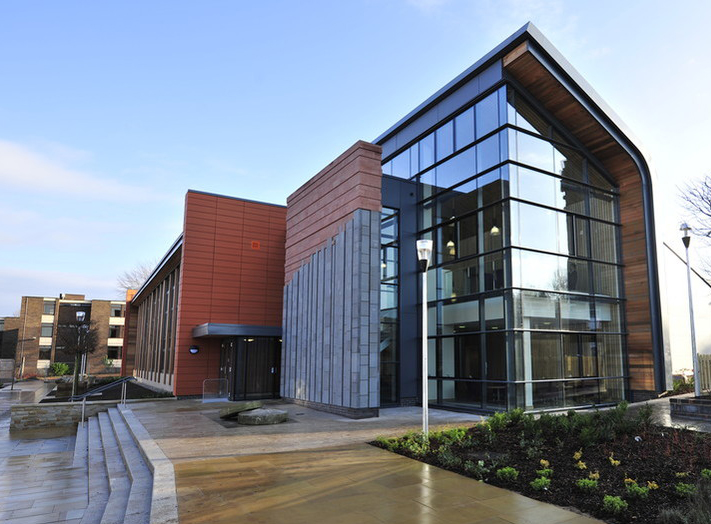 The entrance of the James Hutton Building, lying within the Carboniferous section of the Geological Walk, features a representation of the famous unconformity at Siccar Point — the locality most synonymous with Hutton.