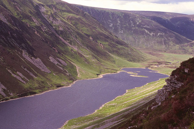 A loch surrounded by high rocky ridges