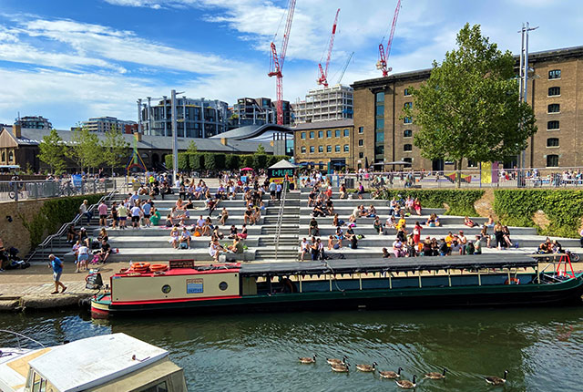 People on the steps at Regent's Canal, Granary Square, King's Cross, London. Source: VVShots/iStock 2020.