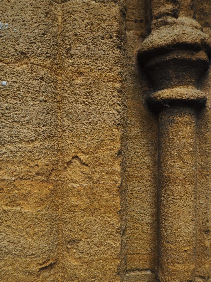 A pillar carved out of light golden-coloured rock