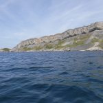 A photograph of the southern coast of the Brandy Bay cliffs; the section of coast between Wolbarrow bay (visible left) and Kimmeridge Bay. These cliffs are comprised of the same Jurassic age Kimmeridge clay. Image taken by myself from my kayak.