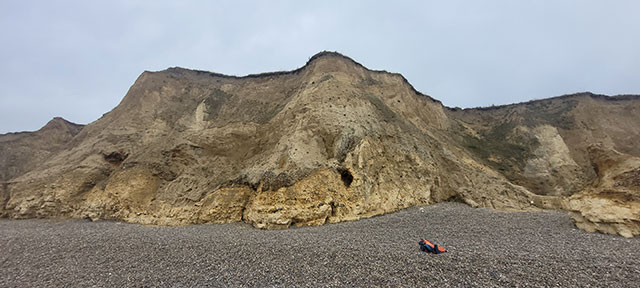 The periglacially altered Wroxham Crag Member and Chalk Group exposed at Weybourne. Catriona Macdonald and Sarah Arkley, BGS © UKRI.