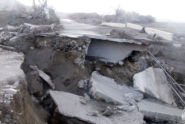 Damaged infrastructure on Montserrat from repeated lahars carving out the embankments along rivers. BGS © UKRI.