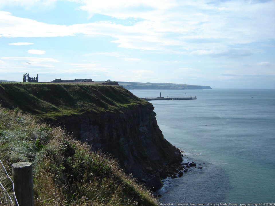 A ruined abbey atop high sea cliffs