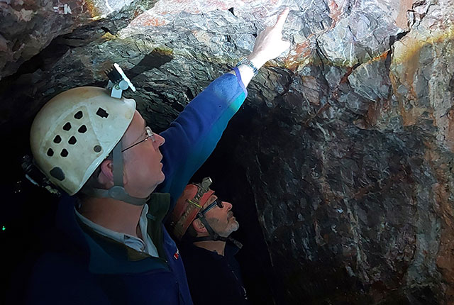 BGS geologists in Wookey Hole, Somerset. The underlying Carboniferous limestones are one of the main targets for deep geothermal potential in Britain. BGS © UKRI