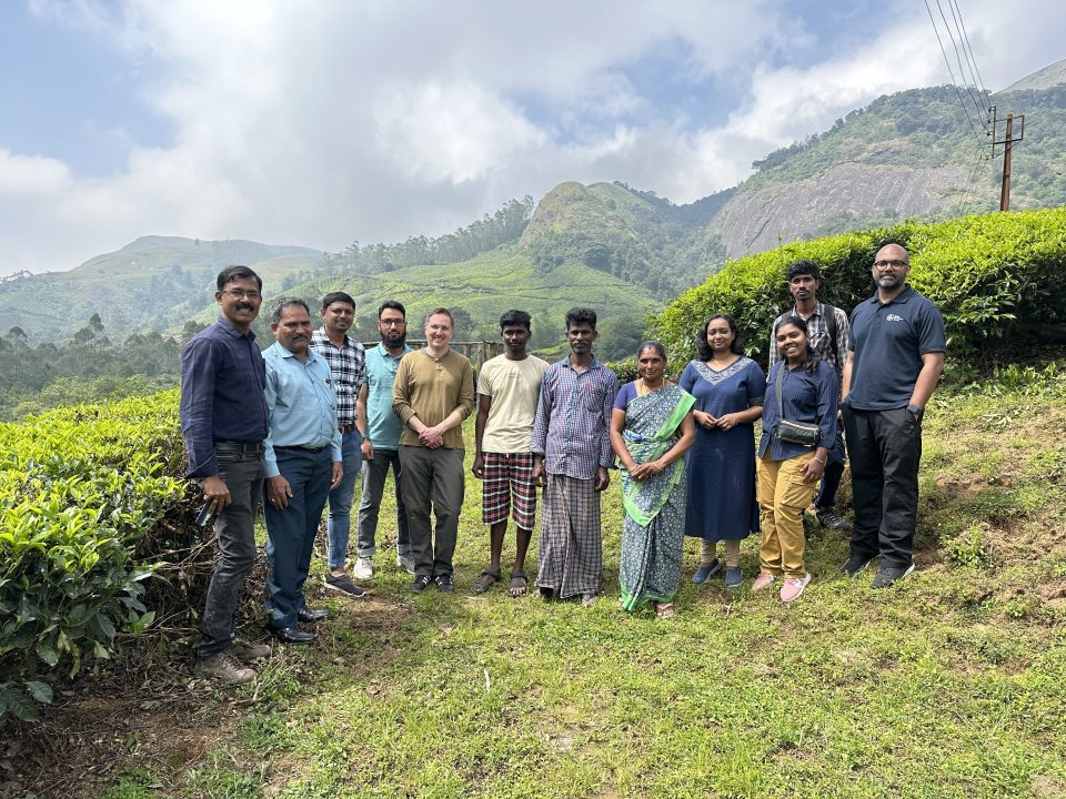 BGS workers stand beside the local community in Pettimudi