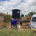 University of Zimbabwe team collecting groundwater samples at a communal borehole facility. Dan Lapworth, BGS © UKRI.