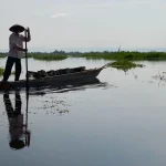 local-fisherman-in-a-traditional-dugout-canoe