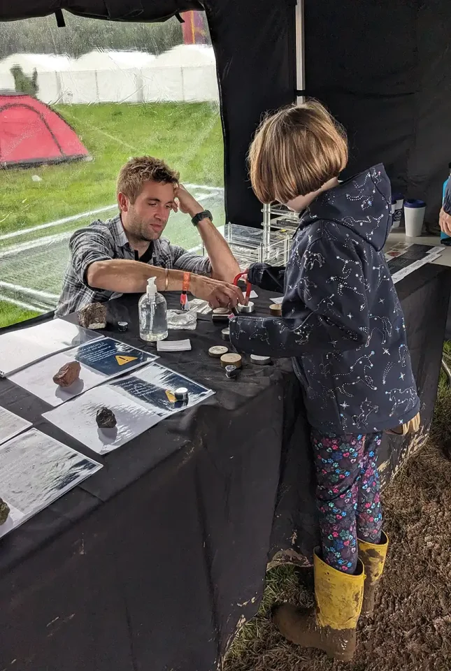 Hydrogeologist Jon MacKay interacting with the public at the bluedot stand. BGS © UKRI.