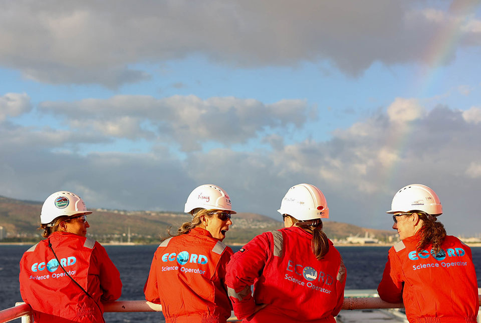 Left to right: Luzie Schnieders (MARUM), Nancy Prouty (USGS), Hannah Grant (BGS) and Mary Mowat (BGS) on the deck as the MMA Valour sets sail. Photo credit MarleyParker@ECORD_IODP