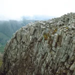 Columnar jointing on the side of a steep valley.