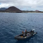 The team on the boat in the shallow waters surrounding Ascension Island. BGS © UKRI.