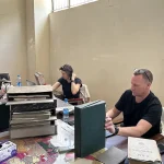 Wayne Newham and Rachel Talbot at work in the GSD Library. © Joseph Mankelow. 