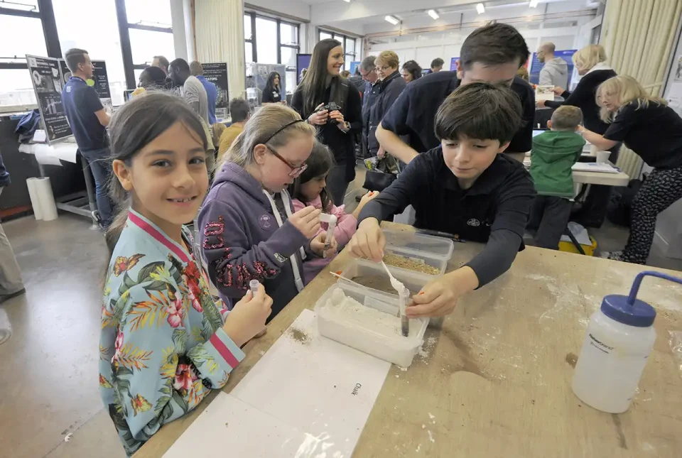 Young people enjoying one of the many science experiments on offer at the BGS OPen Day 2019.