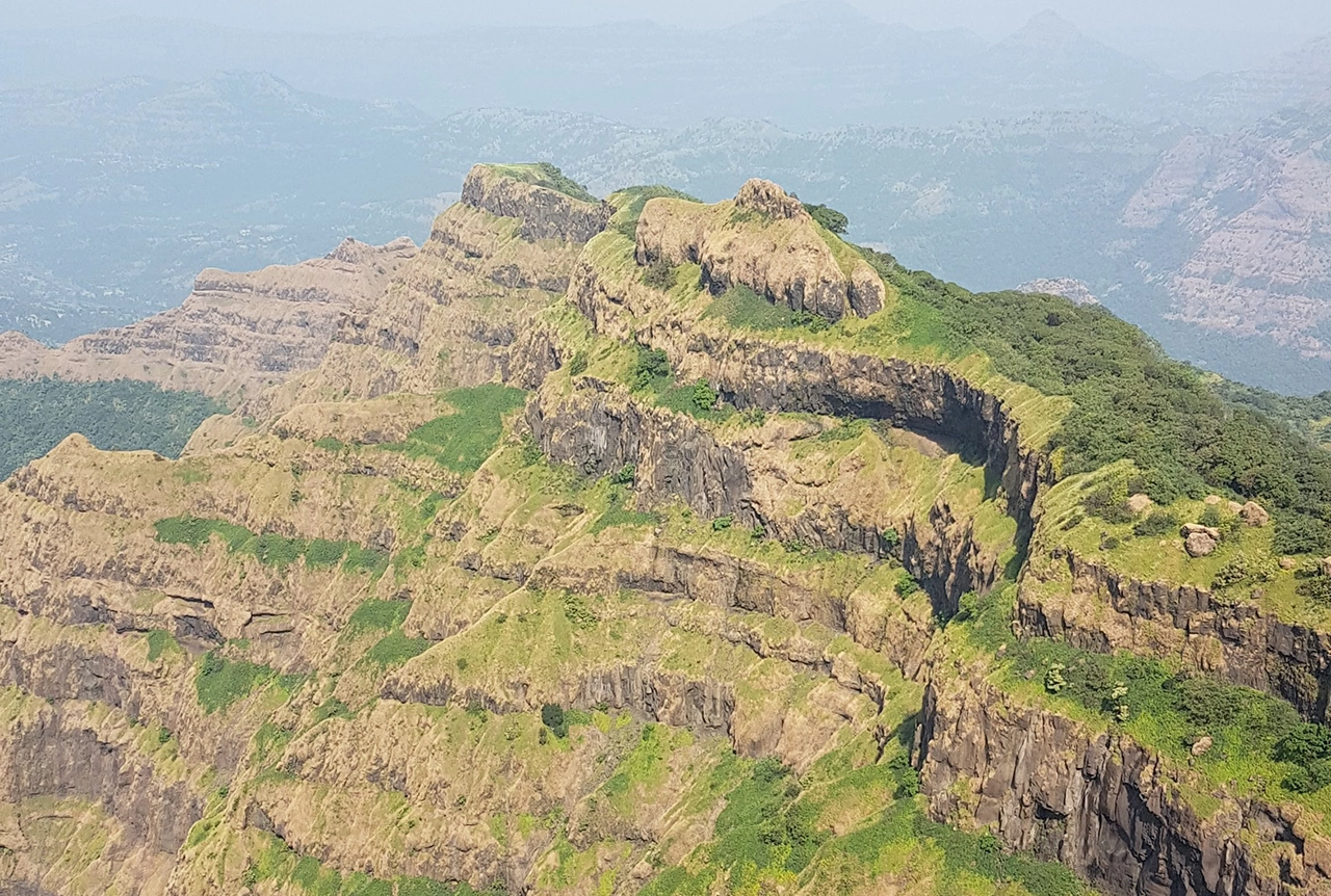 Exposures of thick Deccan Trap basalt sequences from Mahabaleshwar, India. Rocks such as these have been proposed as potential storage reservoirs for disposal of CO2 in India due to their reactive mineral components that allow for trapping of CO2 in solid mineral form. BGS © UKRI