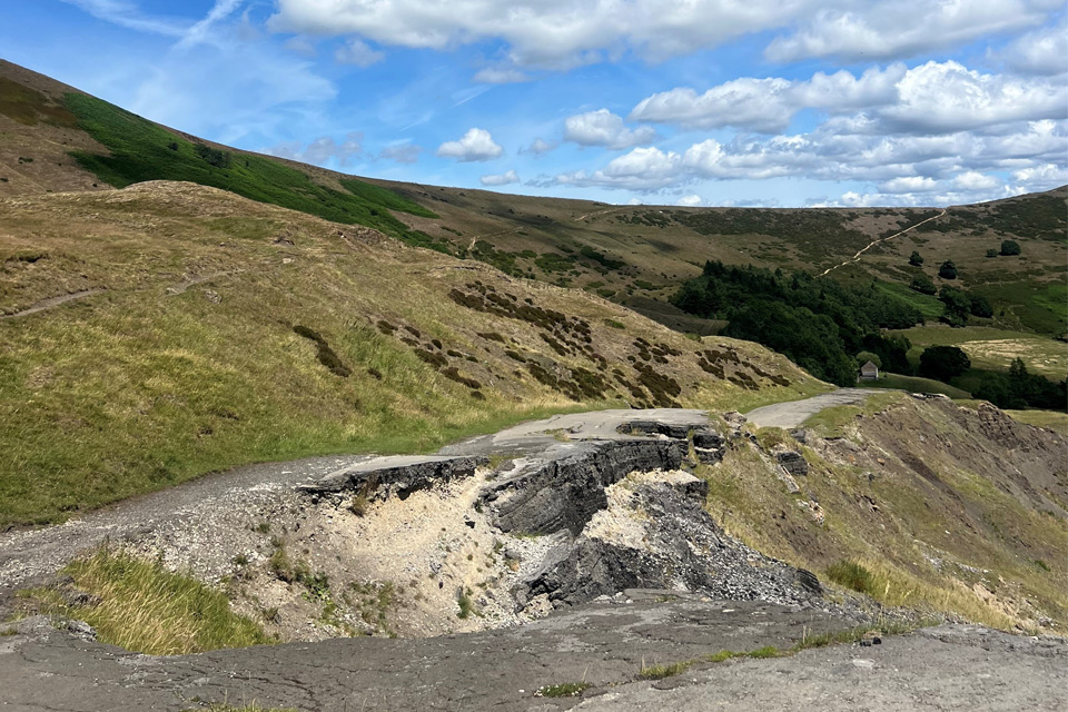 Collapsed road at Mam Tor, Derbyshire, due to a rotational landslide. BGS © UKRI
