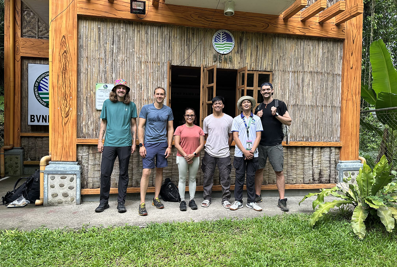 Field team with local guides ready to collect soil samples from the surrounding forest. BGS © UKRI.