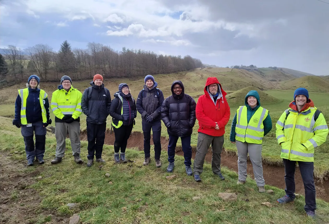 Members of the BGS and Ossian project teams at Carlops during the field trip. The site visit provided an opportunity to discuss glacial geomorphology in the field and explore how onshore analogues can inform offshore interpretations and infrastructure planning. BGS © UKRI.