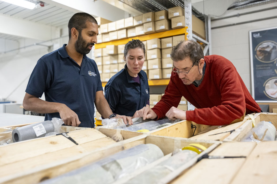 BGS geologists studying the core in the National Geological Repository. BGS © UKRI.