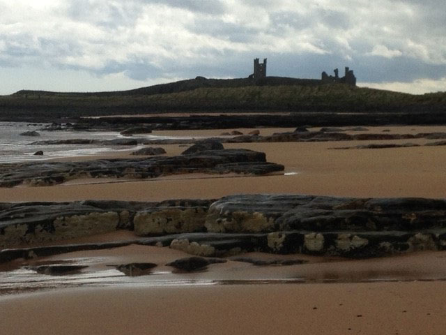 Mixed-beach-and-hard-rock-outcrops-at-Dunstanburgh-Northumberland